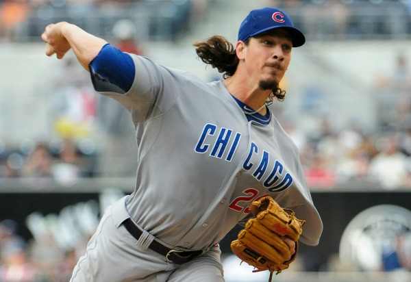 Jeff Samardzija is ??-?? in two seasons as a Cubs starting pitcher. (Denis Poroy/Getty Images)